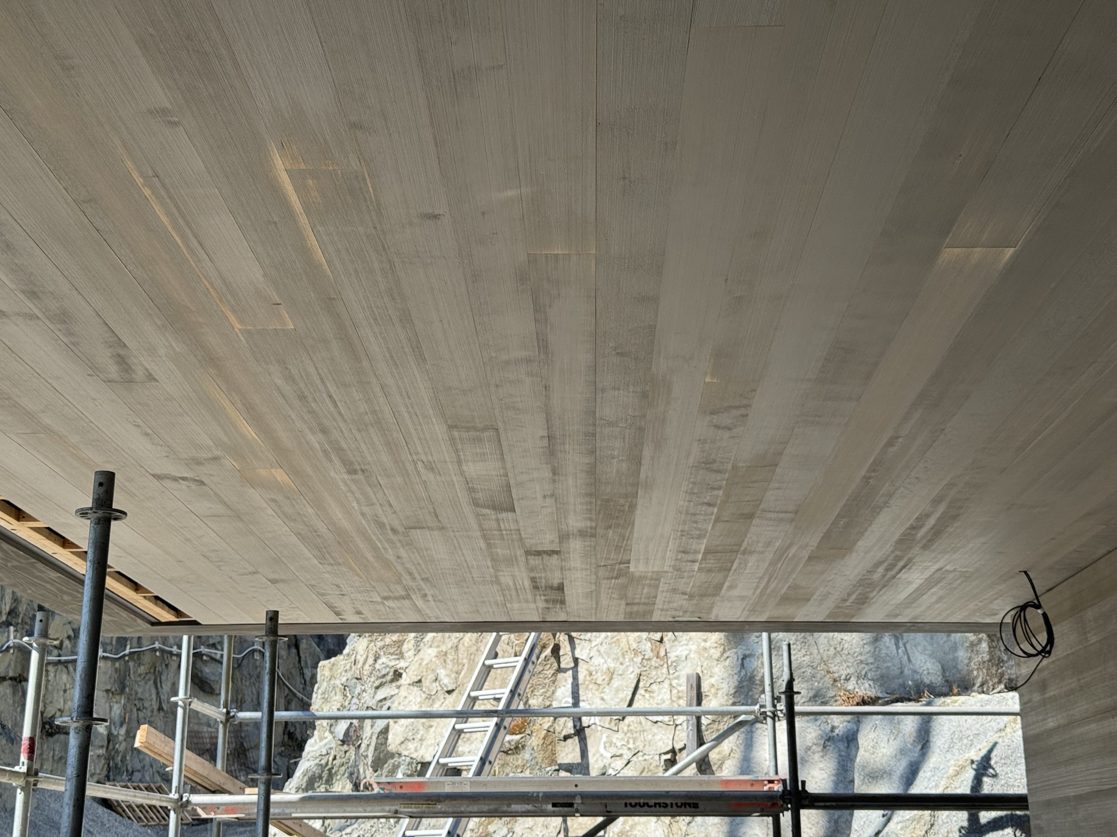 Hemlock soffit and structural glazing detail at the Cove Beach custom home, Sechelt