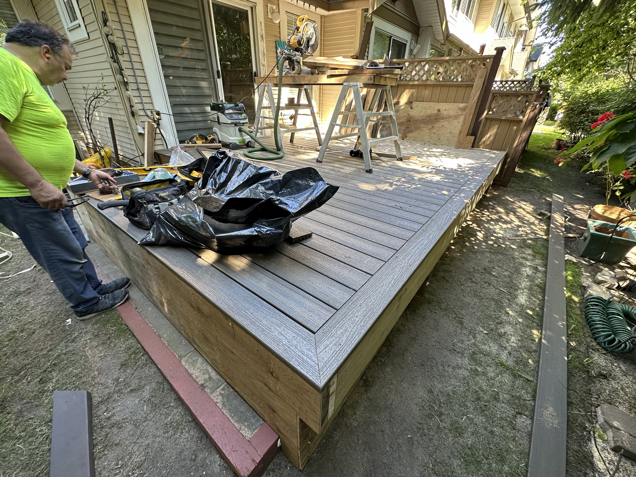 Paula Dhillon new composite deck in Surrey with a picture-frame border and wrapped fascia